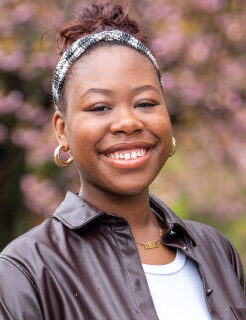 woman holding laptop
