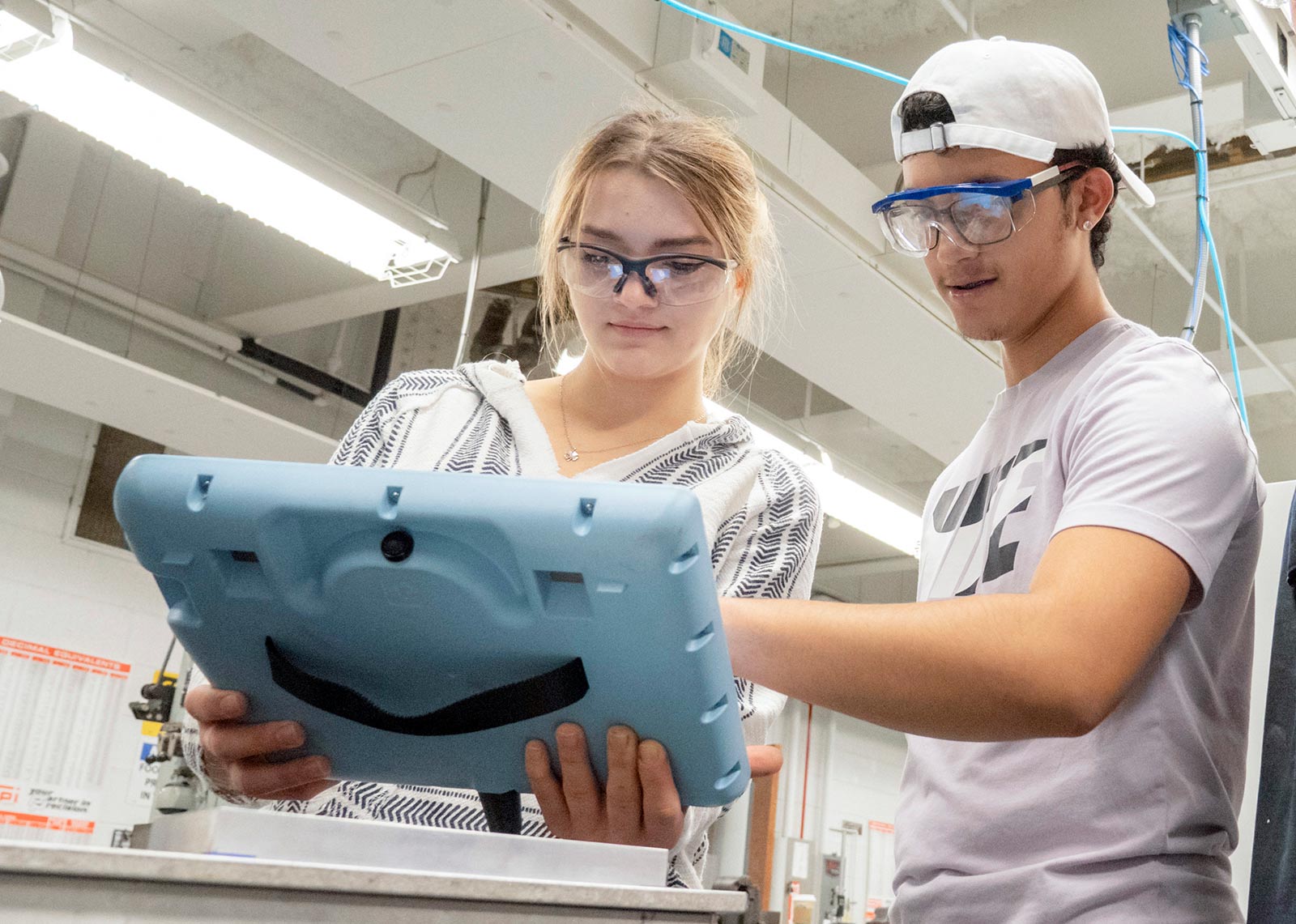 Students in engineering and manufacturing room